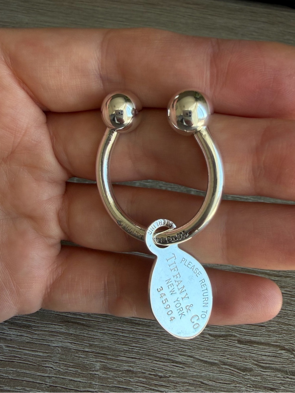 Tiffany & Co Return to Tiffany®
Oval Tag Screwball Key Ring in Sterling Silver